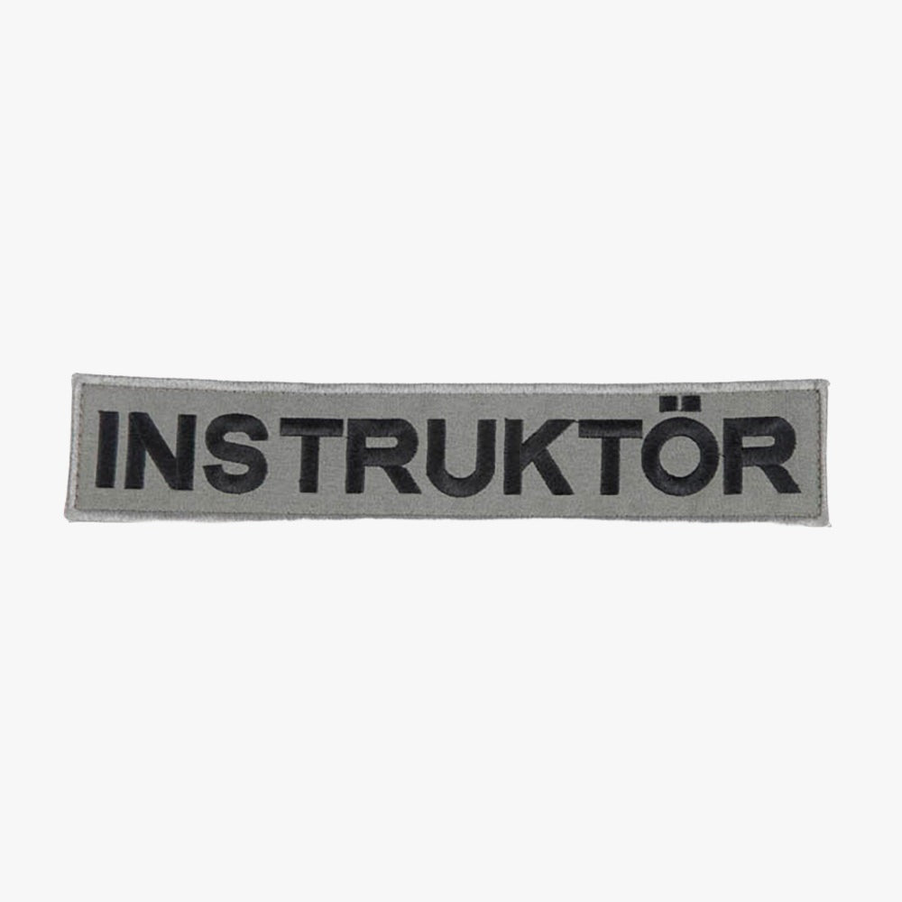 Snigel INSTRUKTÖR-märke (Stort) 260 × 50 mm – Kardborremärke (Grå/Svart)