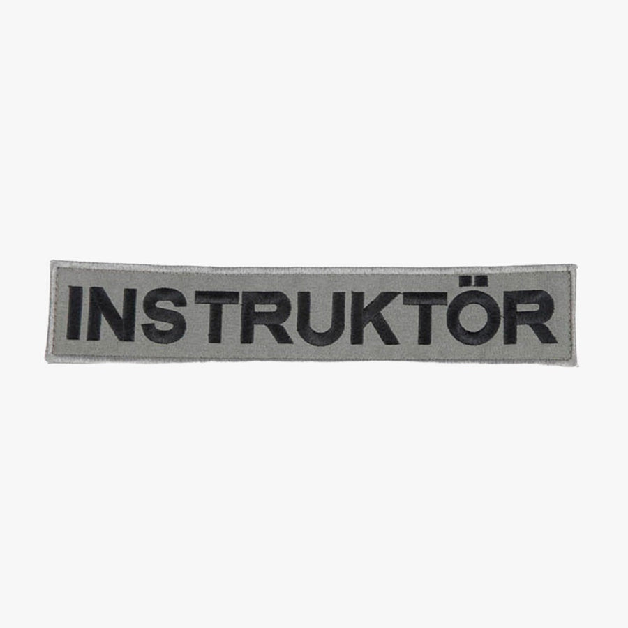 Snigel INSTRUKTÖR-märke (Stort) 260 × 50 mm – Kardborremärke (Grå/Svart)