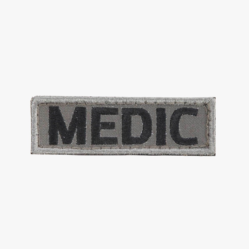 Snigel MEDIC-märke (Small) 80 × 25 mm – Kardborremärke (Grå/Svart)