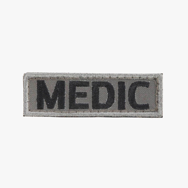Snigel MEDIC-märke (Small) 80 × 25 mm – Kardborremärke (Grå/Svart)