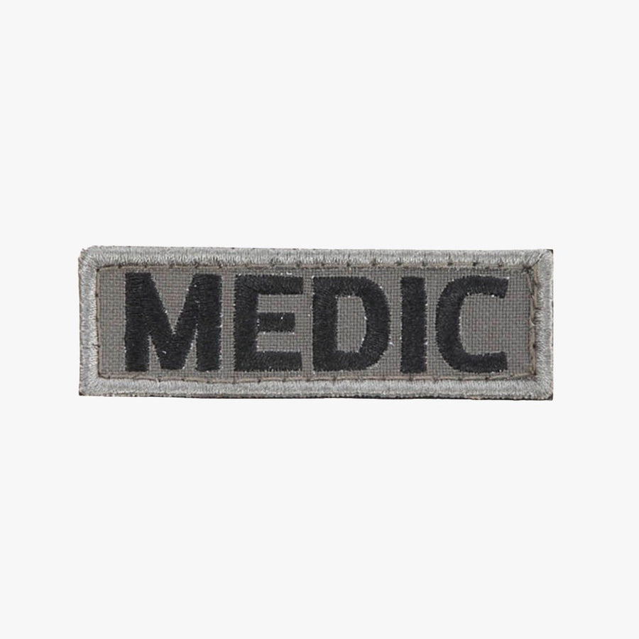 Snigel MEDIC-märke (Small) 80 × 25 mm – Kardborremärke (Grå/Svart)